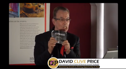 man holding a camera in a business meeting